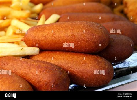 Corn Dogs With French Fries At Street Fair Stock Photo Alamy