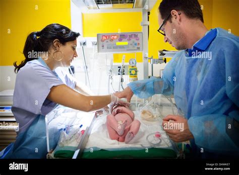 MEASURING HEIGHT, NEWBORN BABY Stock Photo - Alamy