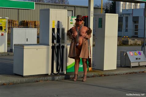 Busty Nude Chrissy Goes For A Naturist Walk Wearing Only A Fur Coat Photos