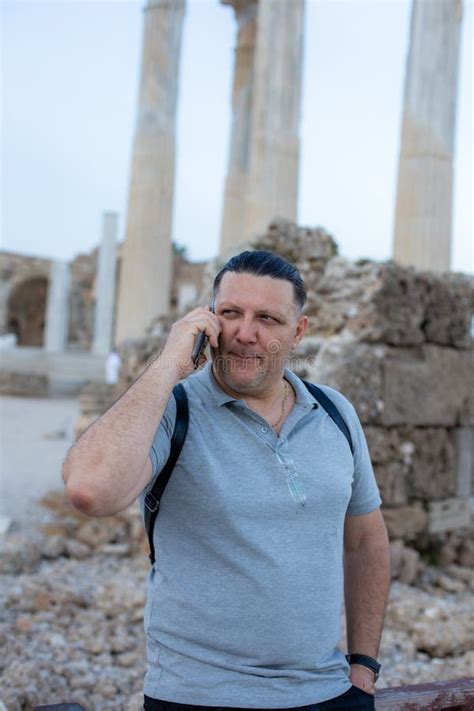 Close Up Portrait Of Happy Mature Guy Talking On Cell Phone And Smiling Stock Photo Image Of