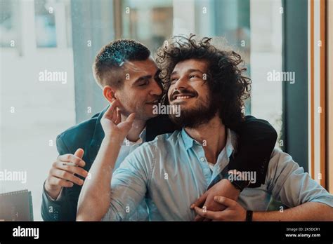 Portrait Of Multiethnic Diverse Gay LGBT Romantic Male Couple Embracing And Showing Their Love