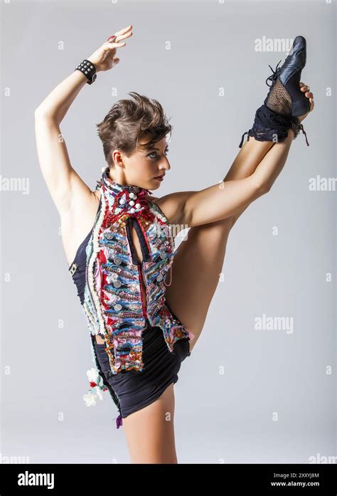 Pretty Brunette Punk Woman In A Sporty And Flexible Pose Stock Photo Alamy
