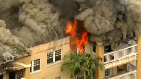 Firefighters Battle Blaze At Apartment Building In Miami After Gunshot