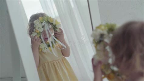 Blonde Three Years Old Baby Posing And Looking At Mirror At Home Slow Motion Stock Footage