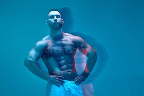 Sportive Guy Bodybuilder Showing Naked Muscular Torso Abdominal And Chest Muscles Long