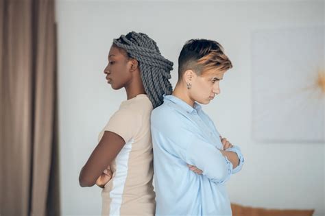 Premium Photo Conflict Same Sex Couple Having An Argument And Standing Back To Back