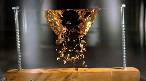Exploding Gold in a Vacuum Chamber