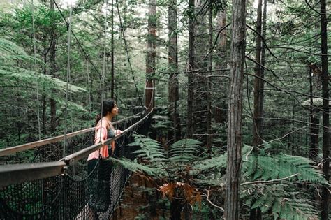 Premium Photo Brunette Caucasian Girl With Colorful Skirt And Pink Shirt Leaning On The