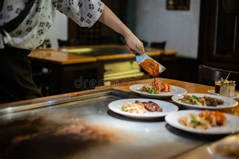 Tepanyaki - Japanese Grilled Beef on Pan. Chef Cooking at the Hot Table Stock Photo - Image of ...