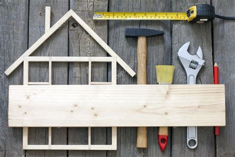 Wooden house construction renovation and tools background — Stock Photo ...