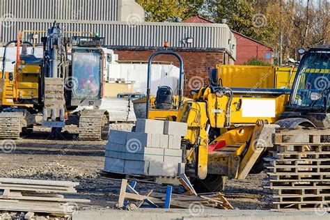 Forklift Lifting And Moving Bricks On A Pallet On Construction Site