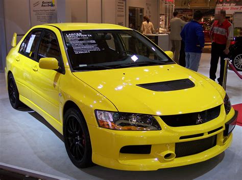 File:Mitsubishi Lancer Evolution IX yellow vr EMS.jpg - Wikipedia