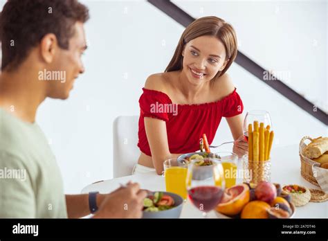 Cute Long Haired Brunette Looking At Her Boyfriend Stock Photo Alamy