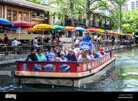 Tourist boat on San Antonio River along the Riverwalk, San Antonio ...