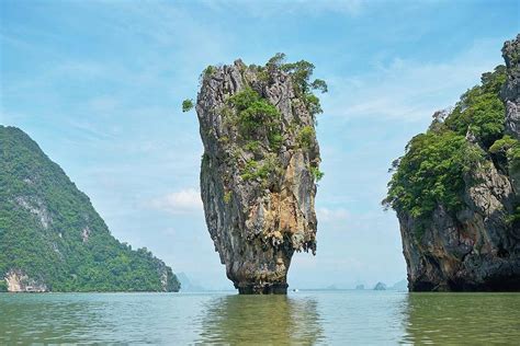 Island With Cliff Rocks Caves Photograph By Mona Master Art Pixels