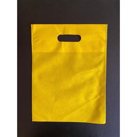 Plain Yellow D Cut Non Woven Bag For Shopping Size Dimension 13x16