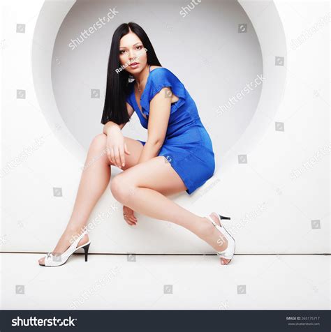 Sexy Brunette Blue Dress Sitting Circle Stock Photo 265175717 Shutterstock
