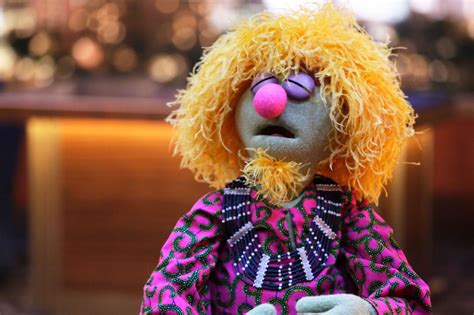 Muppet With Big Lips And Eyelashes