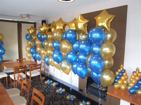 Sapphire Blue And Gold Floor Arrangements All With Gold Star Balloons