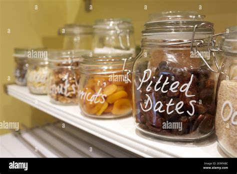 Photograph Of Dried Fruit Nuts And Seeds In Glass Jars Stock Photo Alamy