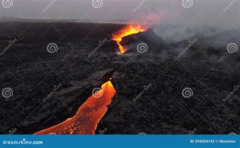 Volcano Eruption At Night Red Burning Lava Erupts From Crater In