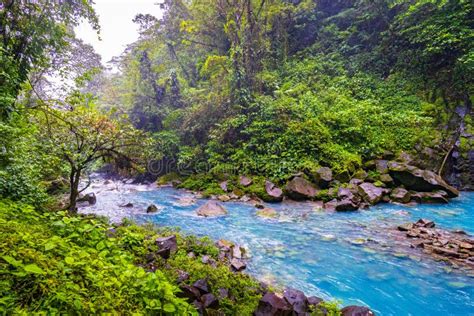 Rio Celeste Waterfall And Pond In Tenorio Volcano National Park