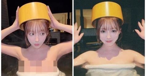 Hot girl quấn khăn tắm nhô người lên khỏi mặt nước khoe body