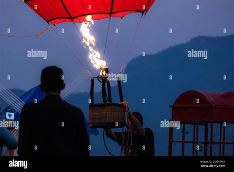 Gas Burner Blowing Up Hot Air Balloon Slow Motion Scene Of Flames Rising And Inflating Hot Air