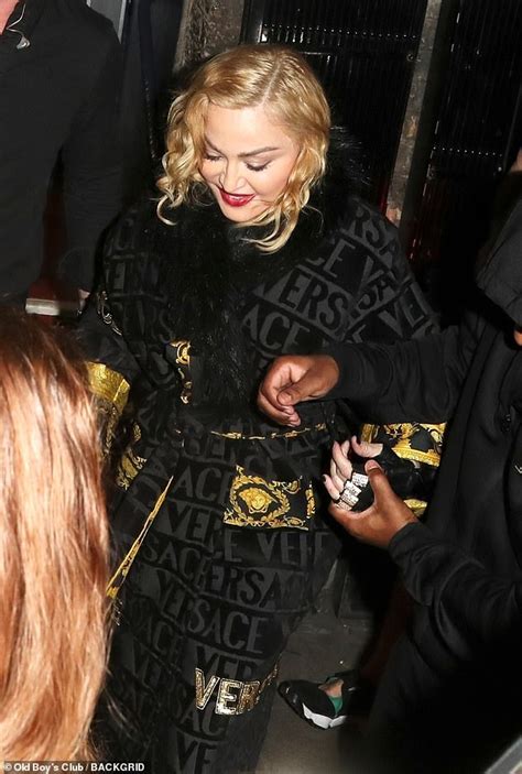 Madonna 61 Relies On Her Cane And Clings Onto An Assistant As She