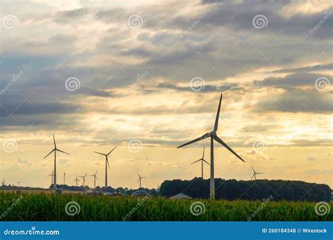 Field Of Wind Turbines On A Cloudy Day Stock Photo Image Of Renewable