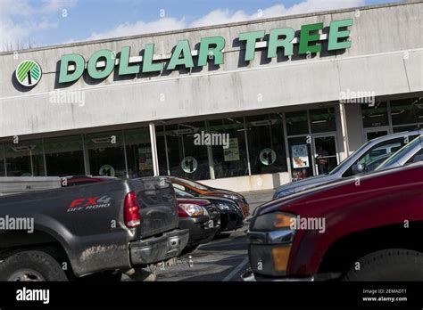 A Logo Sign Outside Of A Dollar Tree Retail Store Location In