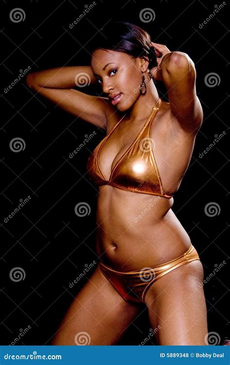 Gold Bikini On Black Stock Photo Cartoondealer