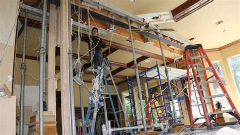how to open a load bearing wall