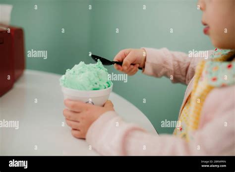 Green Ice Cream Being Eaten Stock Photo Alamy