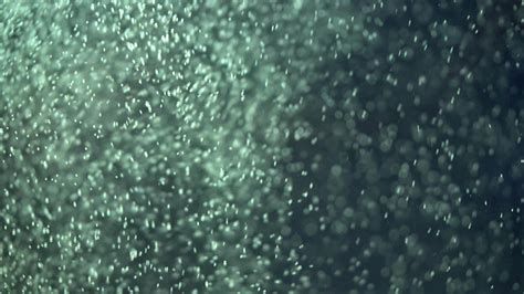4K Underwater Bubbles and dust particles. Water bubbles in aquarium