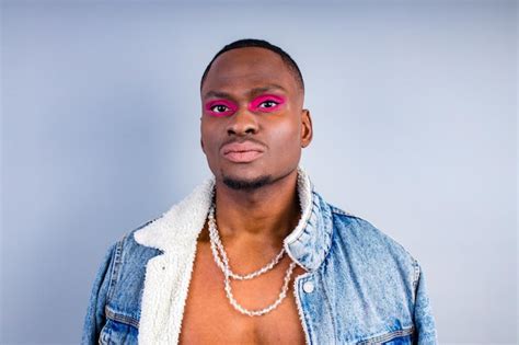 Premium Photo Naked Torso Man With Beauty Makeup Wear Jean Jacket Over A Nude Body In Studio
