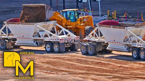 Heavy Machines In Las Vegas Wheel Loader Moving Dirt And Loading Dump