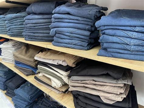 Row Of Pants Denim Jeans In Fashion Store Stock Photo Image Of Pile