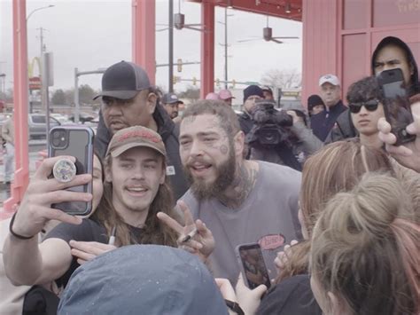 Post Malone Greets Fans Cuts Ribbon At Raising Canes He Designed