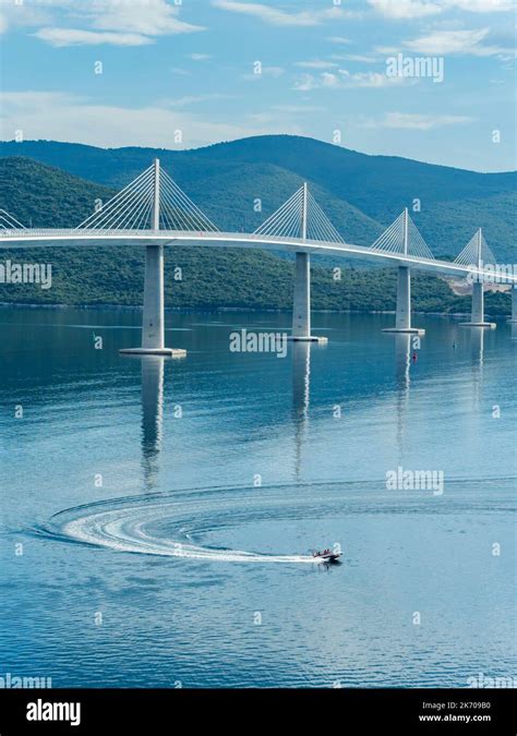 Peljesac Bridge Peljeski Most In Croatia And Plesure Boat In Foreground