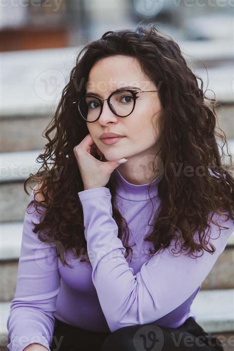 Beautiful Young Woman With Brunette Curly Hair Portrait In Eye Glasses