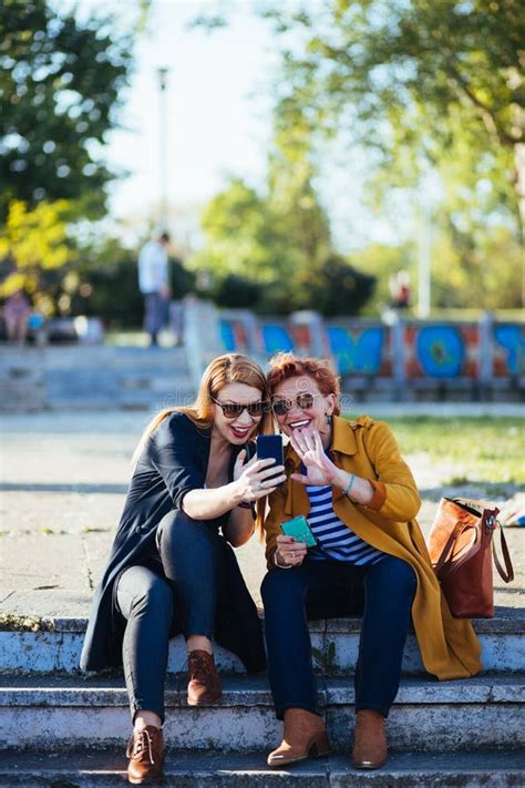 Mature Mother And Adult Daughter Taking Selfie Stock Image Image Of Mother Mobile