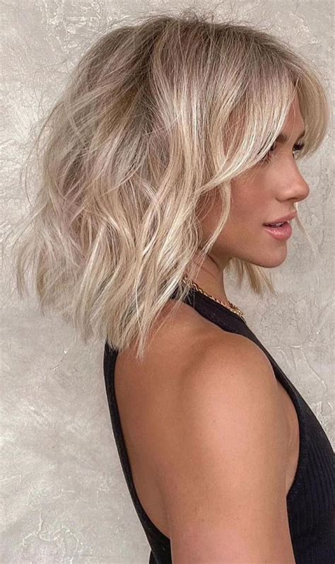 Cute Summer Hair Color Ideas 2021 Vanilla Blonde Bob With Curtain Bangs