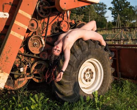 Nude Woman Posing On A Large Tractor Wheel Stock Image Image Of Caucasian Nudism