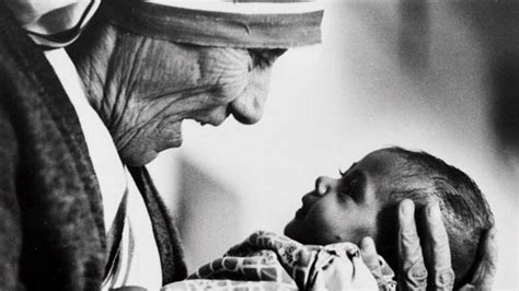 Mother Teresa Helping The Poor