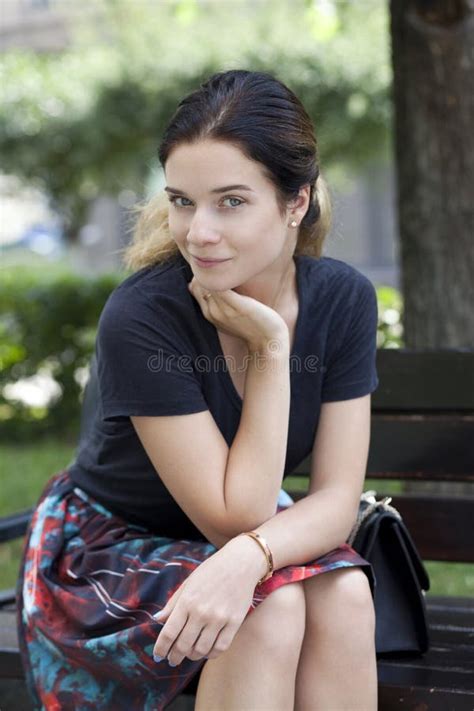 Brunette Sitting On A Bench Stock Image Image Of Brunette Girl