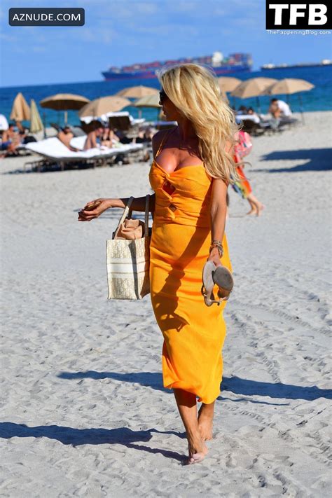 Victoria Silvstedt Lounges Beachside In Miami In An Orange Two Piece Bikini AZNude
