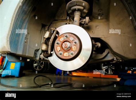 Front Disc Brakes And Calipers Without The Car Wheels In The Auto