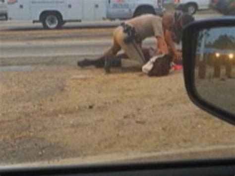 California Highway Patrol Officer Filmed Repeatedly Punching Black