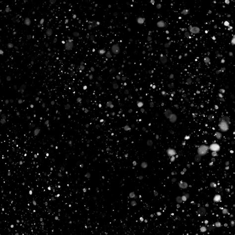 Premium Photo Snow Falling On A Black Background